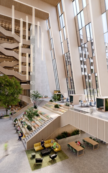 Digital rendition of Construction City, showing a spacious modern interior with multiple levels, large windows, seating areas, greenery, and wooden design elements.